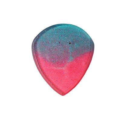 Reverse side of teal and pink resin guitar pick showing back profile