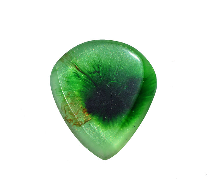 The front side of a  resin guitar pick with a dark green to black marbled center and subtle gold glitter