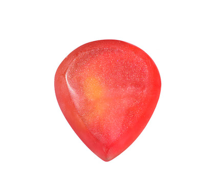 Back side of a  teardrop-shaped resin guitar pick with a glossy, translucent red finish